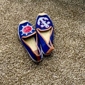 5.5 Tory Burch Canvas girl shoes.